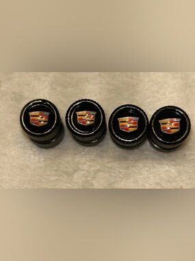 Cadillac Black Valve Stem Caps with Crest Logo